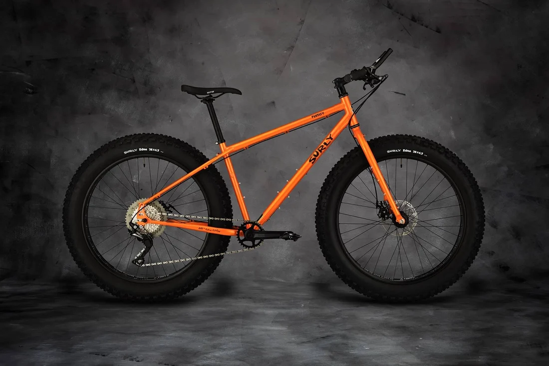 Surly Pugsley fat bike side view Candied Yam Orange color